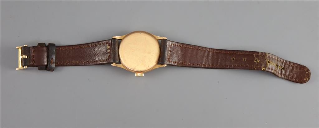 A gentlemans 18k gold Patek Philippe & Co manual wind wrist watch,